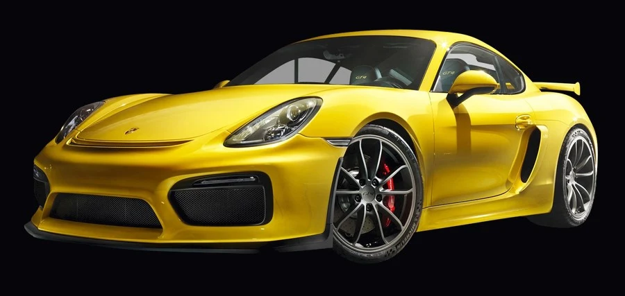 Yellow Porsche Cayman GT4 with paint protection film zones highlighted